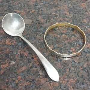 Vintage Sterling Cream Ladle and Taxco Sterling Bangle Bracelet.